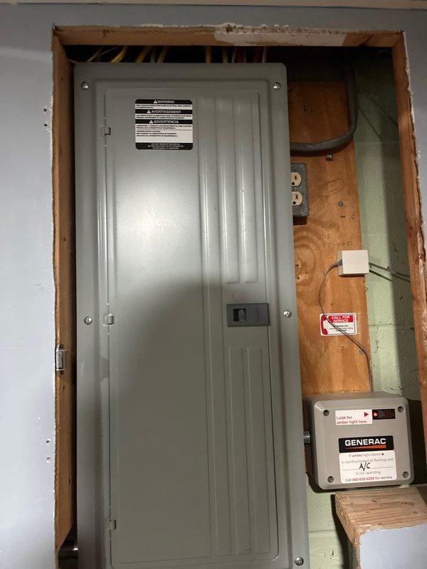Conducted inspection of heating system where customer's furnace requires significant repairs. Evaluated electrical panel installation with Generac transfer switch for generator backup system. Noted that the AC unit is relatively new and in good condition. Presented replacement options for the furnace while documenting the current water heater setup with expansion tank and associated plumbing in the mechanical room.