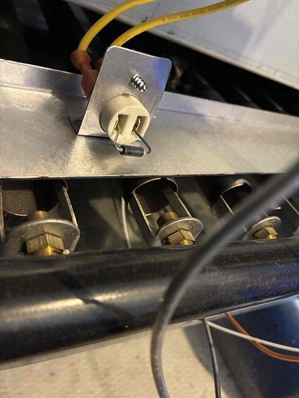 Performed scheduled boiler maintenance service. Inspected electrical connections and found all terminals secure with proper wire routing. Checked system pressure gauge reading approximately 18-20 PSI, which is within normal operating parameters for this boiler system.