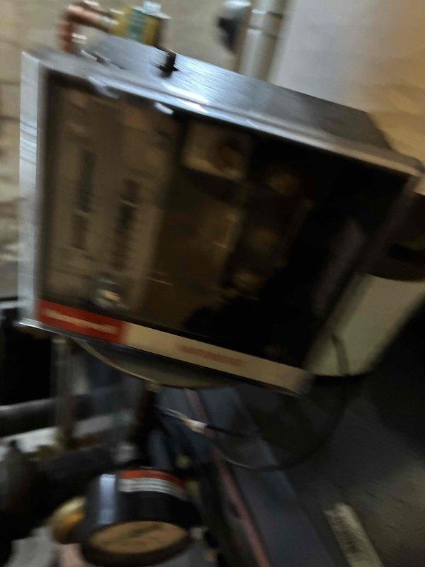 Performed scheduled boiler maintenance service including comprehensive inspection of system components. Conducted combustion analysis using Testo 310 analyzer, verifying proper operation with readings of 16.9% and 22.6% recorded. All parameters confirmed within manufacturer specifications; system operating efficiently.
