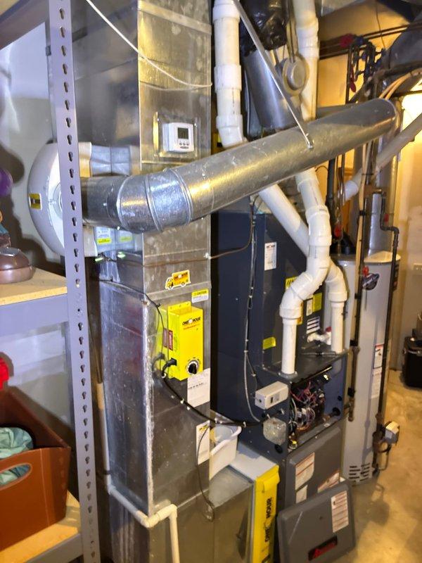Performed inspection of existing HVAC system with focus on furnace replacement options. Evaluated electrical control panel and current installation configuration. Presented customer with three Goodman gas furnace options: standard 80% AFUE model with basic coverage, mid-tier 96% AFUE model with enhanced coverage, and premium 96% AFUE model with comprehensive parts and labor protection. System would integrate with existing ductwork and PVC venting infrastructure.