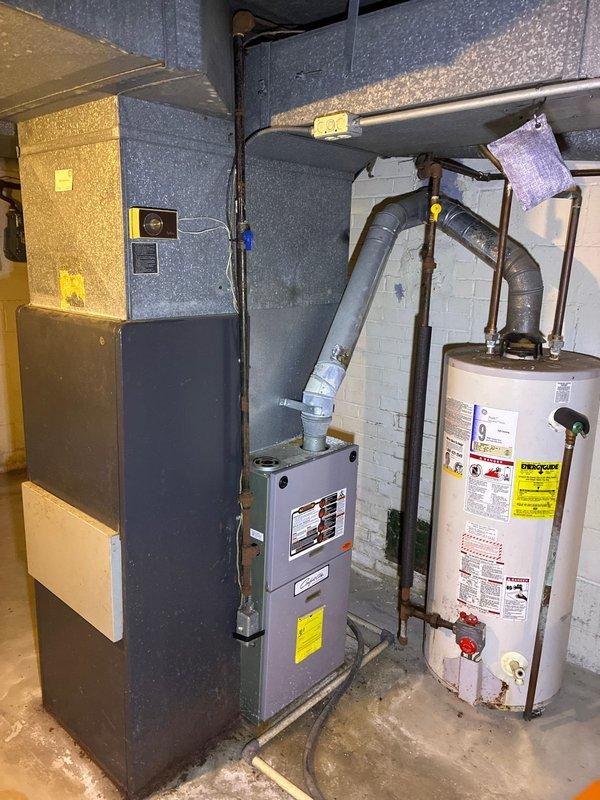 Conducted full system replacement assessment of aging Amtaire HVAC system located in basement utility area. Presented three-tier heat pump and air handler replacement options featuring progressively improved efficiency ratings (up to 8.2 HSPF/17.2 SEER) and warranty coverage. Customer also requested inclusion of electrical panel upgrade in final quote.