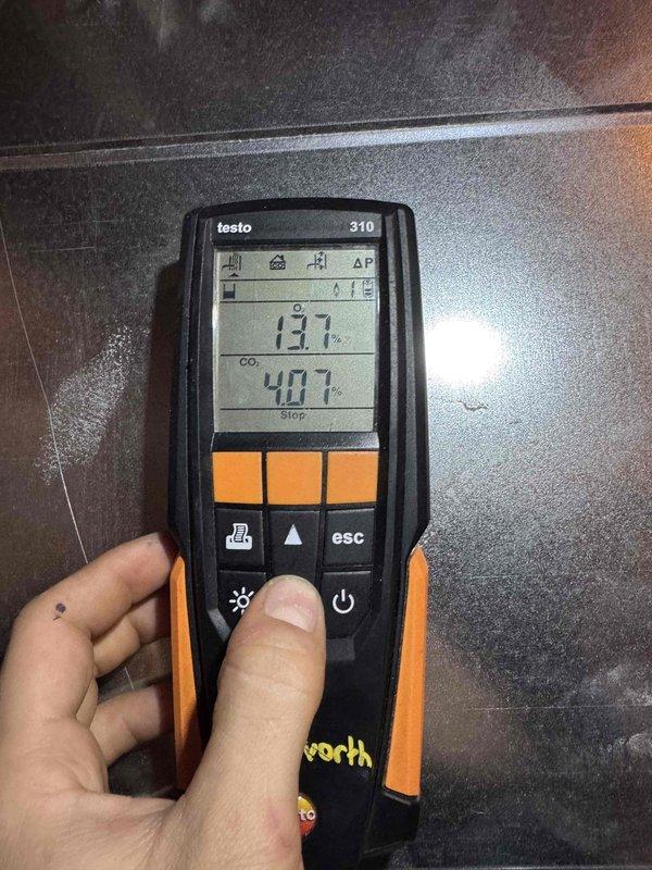 Responded to no heat complaint for furnace system. Performed combustion analysis with Testo 310 showing CO2 readings of 40.7%, and conducted pressure testing with UEI EM201B manometer showing negative pressure reading of -0.051. Restored proper heating operation after diagnostic testing.