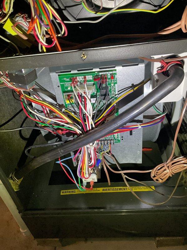 Performed annual maintenance on dual heating systems. Inspected furnace electrical components including circuit board and wiring connections. Systems were found in good working condition with all connections secure and properly functioning.