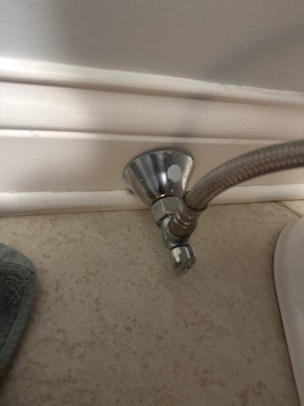 Replaced faulty shut off valve, installing new chrome angle stop with stainless steel braided supply line. Ensured proper connection to wall fixture and verified no leaks upon completion.