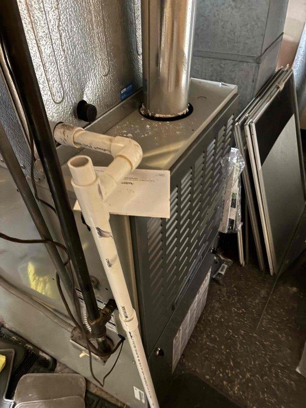 Responded to emergency service call for 10-15 year old furnace not staying on after recent power outage. Inspected system, replaced dirty air filter, and reset control board. System now operating properly with stable flame and normal heating cycle.