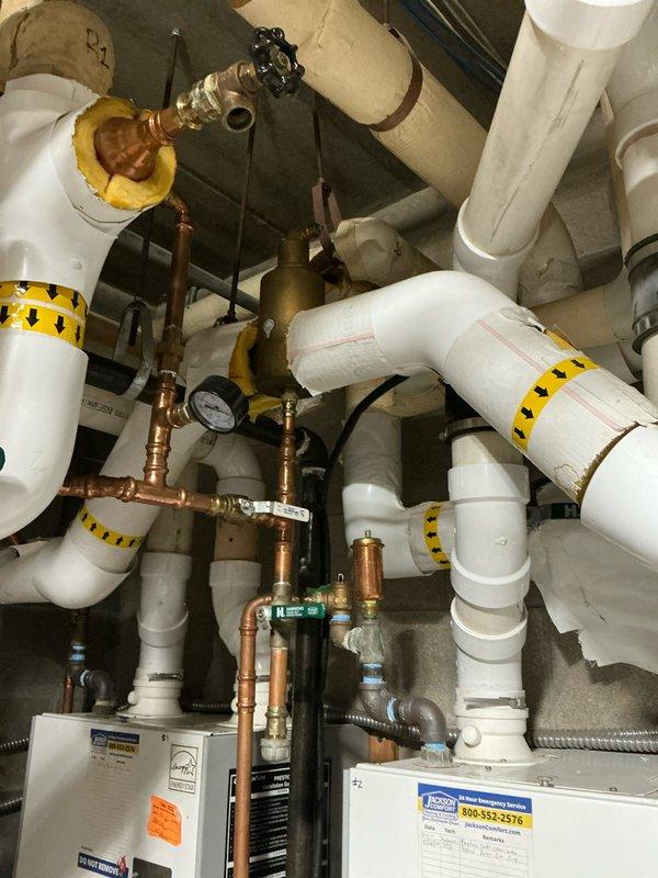 Conducted commercial boiler assessment and provided multiple replacement options for client's aging system. Inspected electrical service disconnect, control wiring, and existing PVC/copper piping configuration. Documented current installation with photographs to develop comprehensive quote for 2-3 boiler solutions that will address the client's heating requirements.