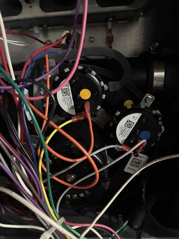 Performed scheduled heating maintenance on HVAC system. Inspected and documented condition of air filter showing moderate dust accumulation. Examined electrical components including pressure switches and wiring connections to ensure proper operation of the heating system.