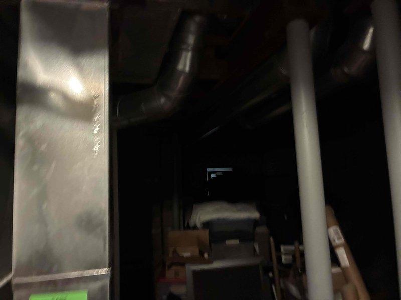 Conducted site visit for garage heater quote assessment. Inspected current mechanical room configuration with existing ductwork, plumbing components, and utility connections to determine appropriate heating solution requirements for the garage space.
