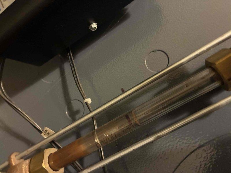 Performed scheduled contract maintenance on boiler system. Inspected anchoring hardware and verified proper mounting of the equipment to the foundation. Examined sight glass assembly and associated brass fittings, confirming proper fluid levels and absence of contaminants. All components functioning within normal parameters.