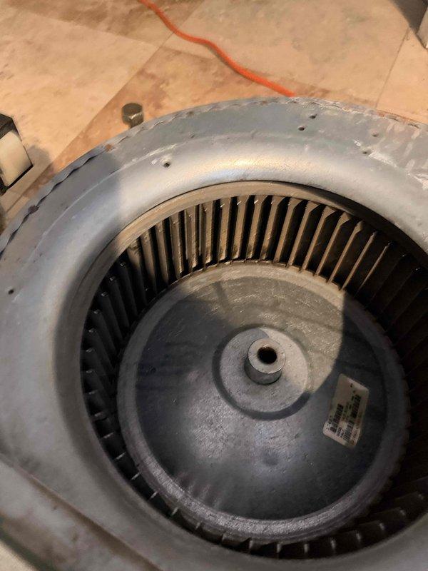 Responded to customer complaint of unusual noise during furnace operation. Diagnosed issue as worn blower wheel assembly causing vibration and noise. Removed and replaced damaged squirrel-cage fan component, ensuring proper installation and alignment with motor shaft. System tested after repair with normal operation restored and no further noise detected.