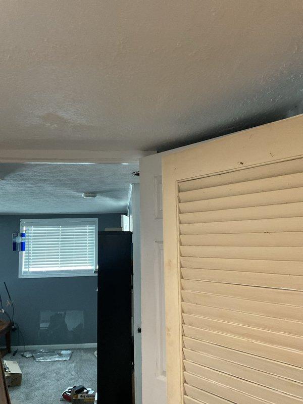 Performed comprehensive system check for new homeowner. Inspected residential furnace unit located in utility area, including verification of proper ventilation, gas supply connections, and condensate drainage system. No operational issues identified during inspection.