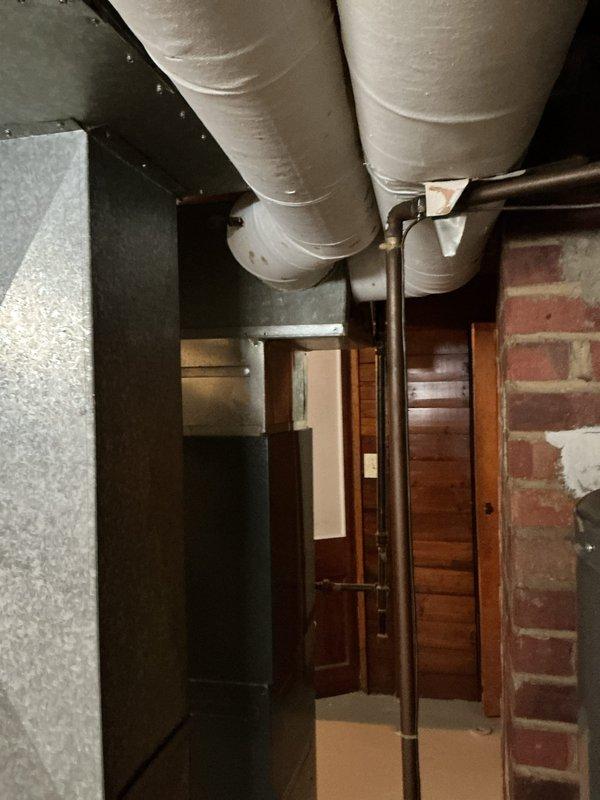 Performed standard heating tune-up on basement furnace system. Inspected air handler, ductwork, and ventilation components for proper operation. Verified all PVC exhaust/intake piping connections were secure and functioning correctly.