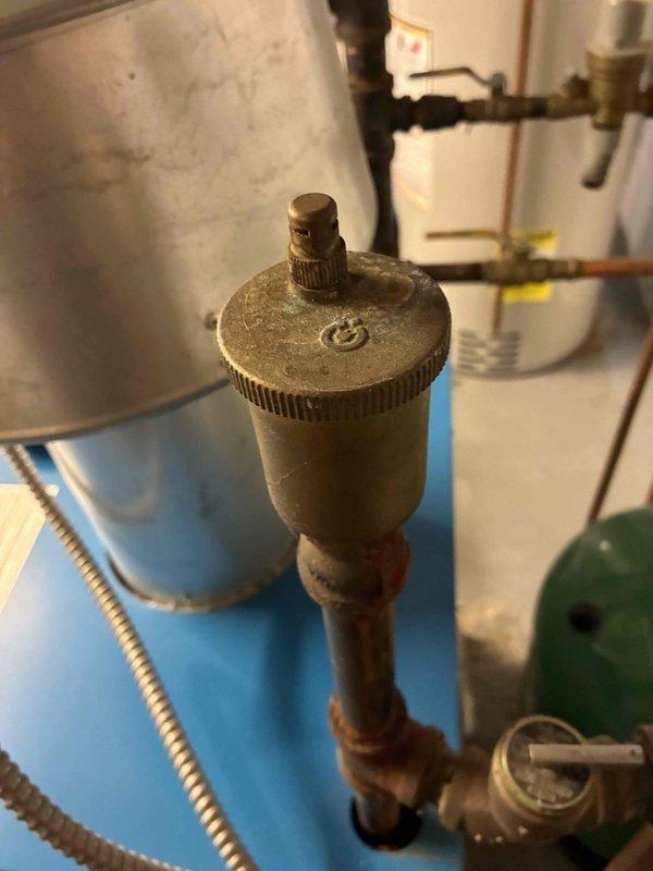 Completed routine maintenance on three heating systems. Performed combustion analysis with Testo 310 analyzer, measuring O2 levels at 86% and CO at 125 ppm. Inspected and serviced air vent valve, noting minor corrosion on connecting copper pipe that requires monitoring.