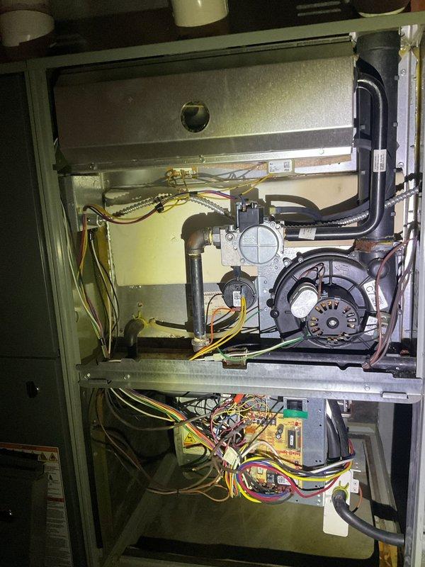 Performed scheduled maintenance on dual furnace system. Inspected and tested all components including electrical connections, motor assembly, and circuit board. Both units are functioning properly with clean connections and no visible issues in the ventilation system.