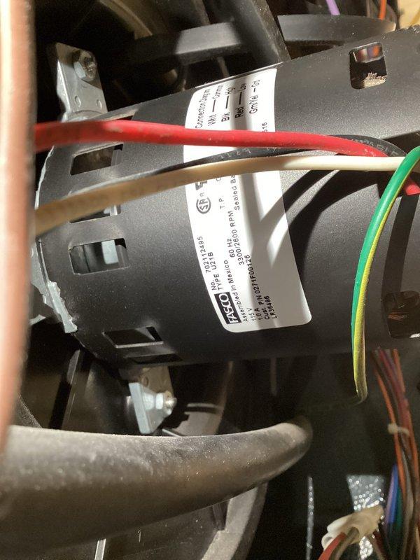Performed routine heating maintenance service on customer's HVAC system. Inspected motor components and electrical connections, confirming proper wiring configuration of the blower motor assembly. All systems verified to be functioning within normal parameters.