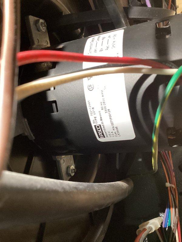 Performed routine heating maintenance service on customer's HVAC system. Inspected motor components and electrical connections, confirming proper wiring configuration of the blower motor assembly. All systems verified to be functioning within normal parameters.
