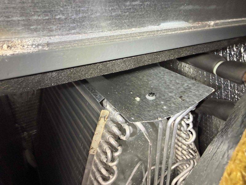 Performed routine monthly heating maintenance service on furnace system. Inspected blower wheel assembly for proper operation and cleaned to remove buildup. Examined heat exchanger coils, noting normal wear with some dust accumulation that was cleaned to ensure optimal heat transfer efficiency.