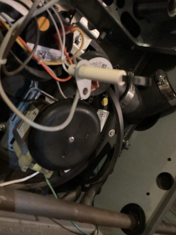 Performed scheduled monthly maintenance service on two heating systems. Conducted combustion analysis with Testo 310 analyzer showing 10.18% CO2 and 8.7% efficiency readings at 26.8°C. Inspected and verified proper operation of blower motor assembly, checked all electrical connections, and confirmed system components were functioning correctly.