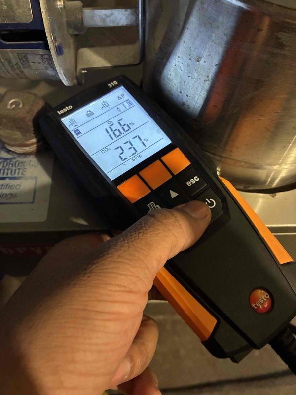 Performed scheduled maintenance service on customer's boiler system. Conducted comprehensive diagnostic testing using Testo 310 analyzer, recording temperature readings of 146°F and 231°F. Inspected water heater tank, associated copper piping, and control components to ensure proper operation and system integrity.