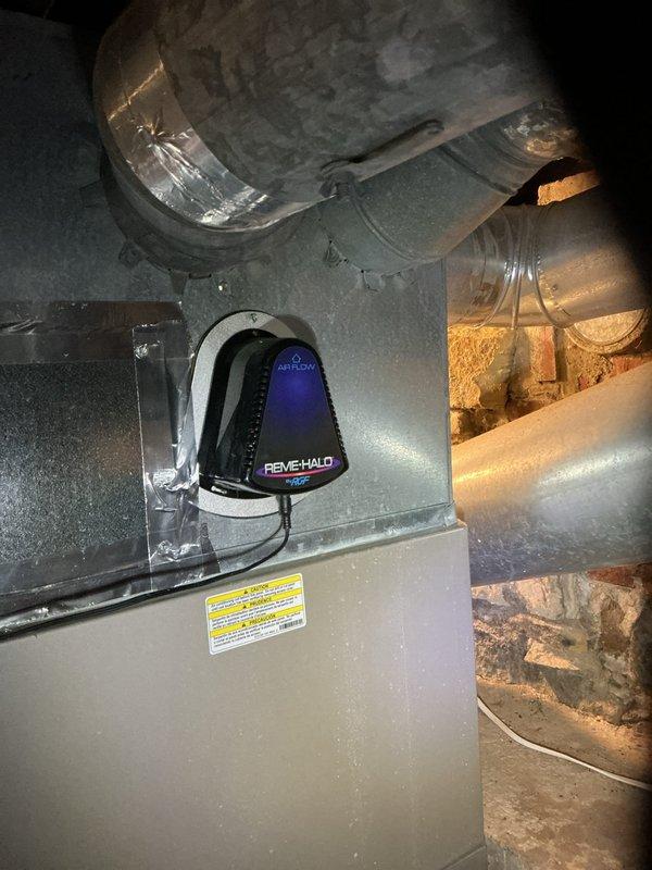 Diagnosed thermostat issue and noise concern on residential furnace system. Inspected control board connections and wiring, finding all components operational. Verified proper function of REME HALO air purification system mounted on ductwork. Recommended semi-annual maintenance program for heating and cooling optimization in older home.