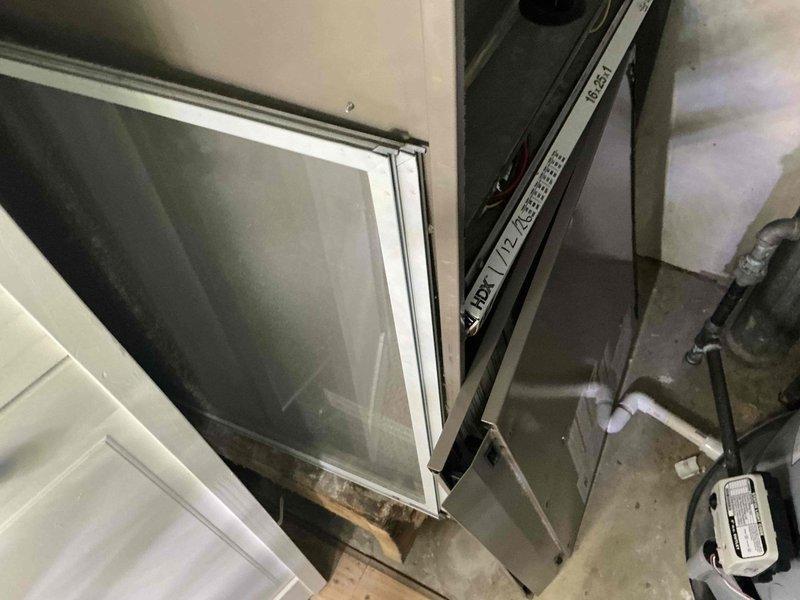 Assessed MagicPak unit with no heat complaint. Inspection revealed deteriorated heat exchanger with visible patching/tape repairs. Presented replacement options to customer for full system replacement.