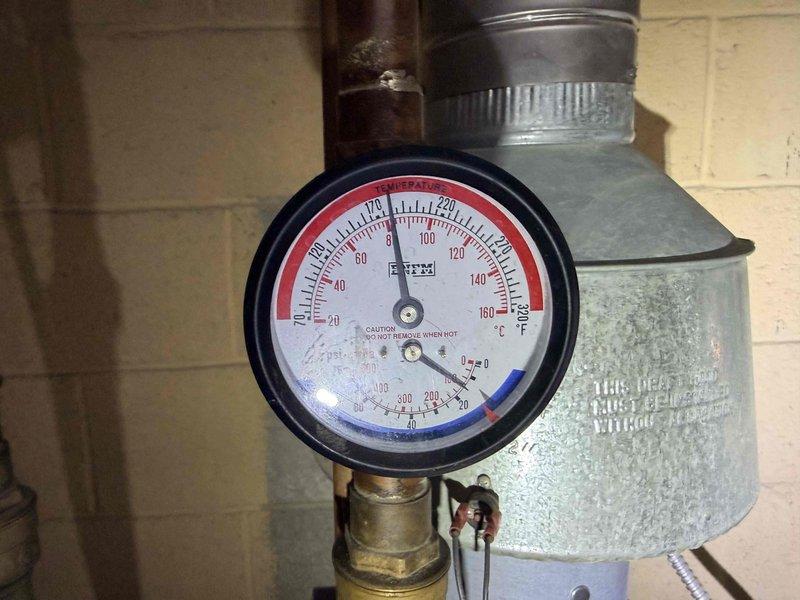 Replaced failed backflow preventer and pressure reducing valve (PRV) in customer's plumbing system. Inspection revealed significant mineral buildup and sediment in the pipes, which was contributing to system pressure issues. New components were installed and system operation was verified with proper pressure readings.