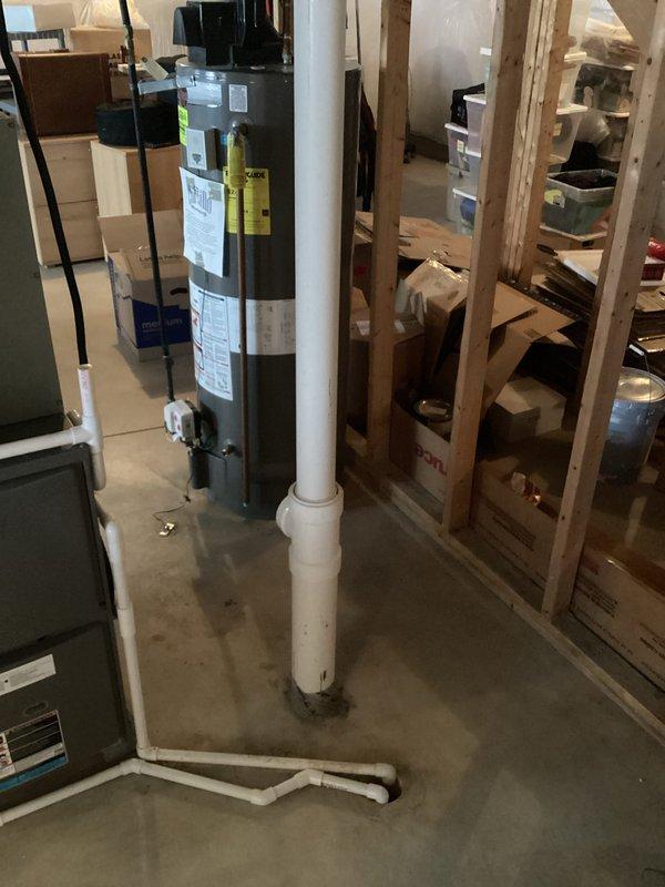 Conducted a complimentary assessment of existing Rheem water heater installation for replacement quote. Current unit is a 40-gallon vented model with expansion tank and standard plumbing connections. Observed installation area in partially finished basement with adequate clearance for replacement. Customer seeking competitive pricing options after receiving multiple estimates from other providers.