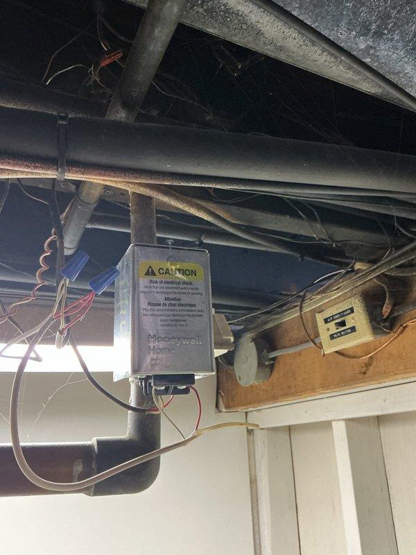 Responded to service call for communication failure between boiler and thermostat. Inspected existing Honeywell Home control module and identified faulty wiring connections at the interface. Restored proper communication by repairing electrical connections between the control board and thermostat system.