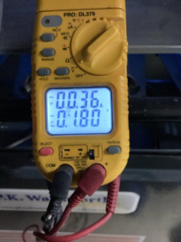 Performed scheduled heating maintenance on furnace system. Conducted electrical diagnostics with multimeter, measuring amperage readings between 0.18-0.19 amps and voltage readings of 344V to verify proper electrical operation of components.