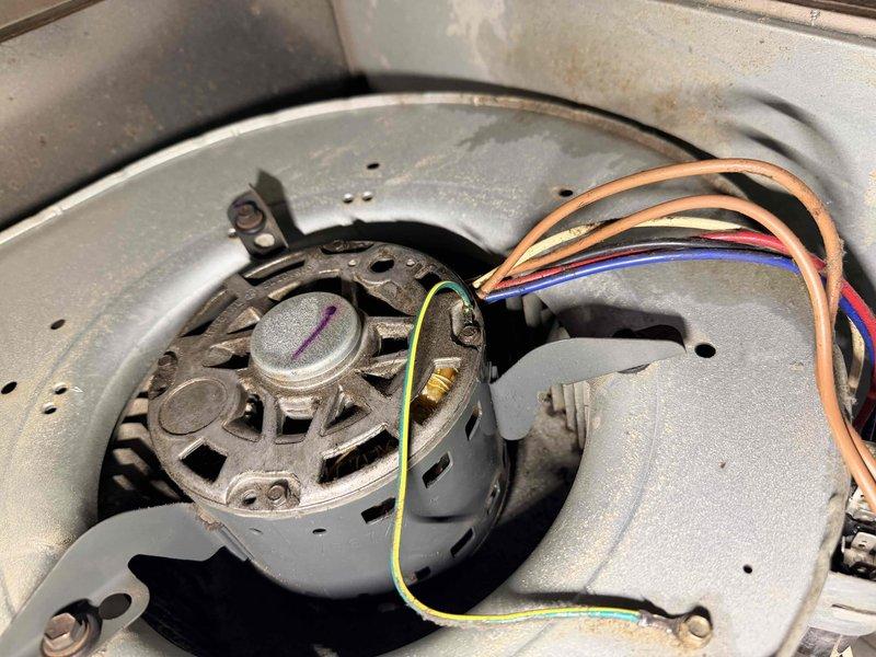 Performed routine maintenance on heating system with focus on blower motor assembly. Removed accumulated dust and debris from motor housing and cooling fins. Inspected electrical connections, noting minor corrosion on wiring harness which was cleaned and secured properly to ensure optimal system performance.
