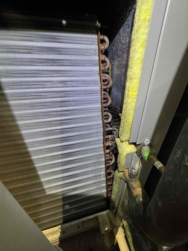 Performed standard heating system tune-up on Lennox furnace unit. Inspection revealed significant rust and corrosion on the evaporator coil's copper tubes and connections. Documented condition with photos for customer review and discussed maintenance plan options.