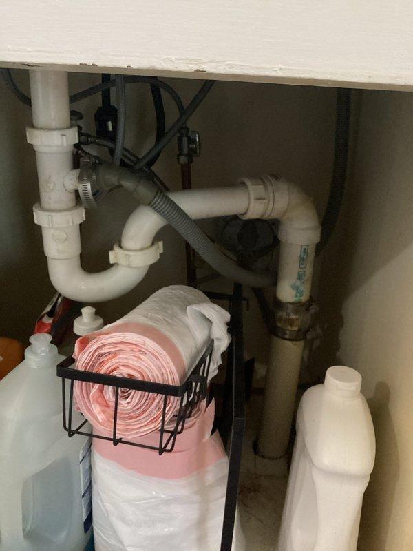 Successfully installed a new Samsung dishwasher in the kitchen, connecting it to the existing plumbing system with proper drainage configuration. Verified all connections were secure and leak-free, ensuring the appliance was properly seated and aligned with surrounding cabinetry.
