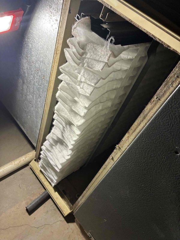 Completed second service call to finalize HVAC maintenance, which included thorough cleaning of the squirrel cage blower wheel to remove accumulated debris and upgrading the filtration system with new pleated filters and installation of supporting filter rails for improved system efficiency and air quality.