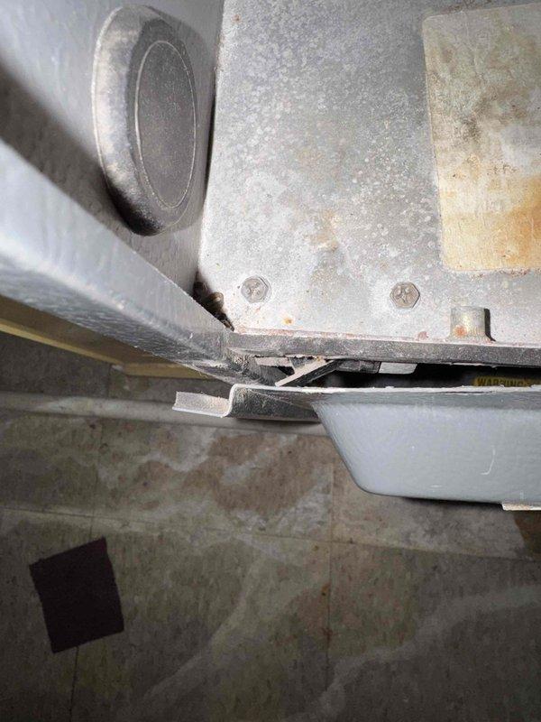 Responded to no-heat service call following previous technician visit. Inspected air handler system in basement utility area, noting dust accumulation on fan unit. Examination of blower motor assembly revealed signs of wear and possible mechanical issues. Serviced equipment to restore proper heating function.