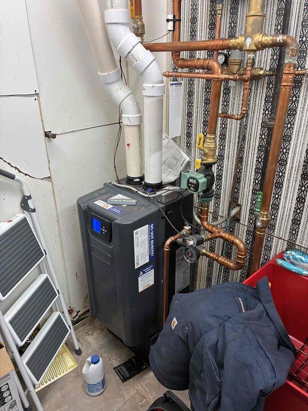 Performed seasonal heating maintenance on residential boiler system. Inspected pressure gauge readings and verified proper operation of all components. Checked copper piping connections, valves, and drainage system for integrity; all systems functioning within normal parameters.