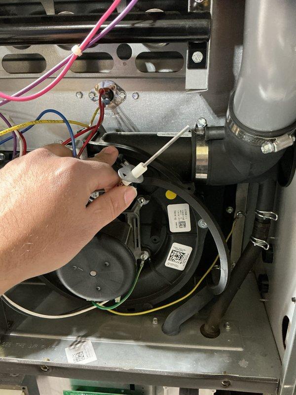 Performed comprehensive heating tune-up on HVAC system, inspecting electrical connections and motor assembly to ensure proper operation. Verified UV-C light functionality and safety components. Replaced water panel filter as requested by customer.