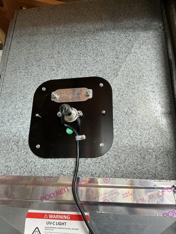 Performed comprehensive heating tune-up on HVAC system, inspecting electrical connections and motor assembly to ensure proper operation. Verified UV-C light functionality and safety components. Replaced water panel filter as requested by customer.