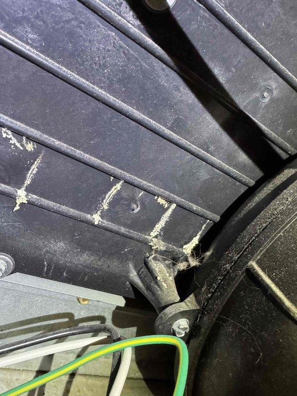 Responded to no-heat service call for aging furnace. Inspection of heat exchanger revealed accumulated dust and residue on critical components. Performed maintenance cleaning of heat exchanger surfaces, inspected fan assembly and electrical connections, restoring proper operation of heating system.