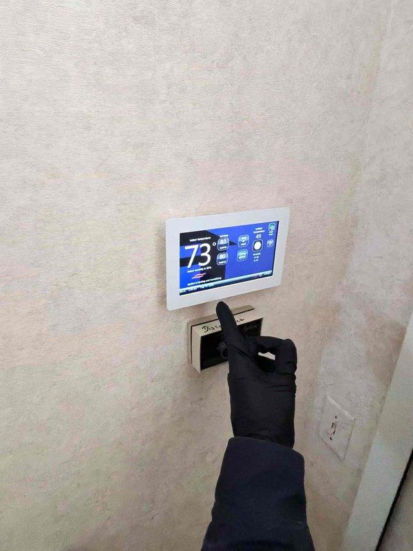 Responded to service call for leaking humidifier. Previous technician was unable to access unit due to space constraints. Water supply was shut off to prevent further leakage. Inspected thermostat system and filter housing, took documentation photos of components for reference.