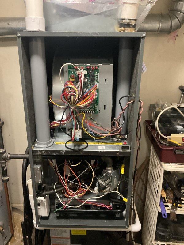 Performed scheduled heating maintenance service on 10+ year old furnace system. Conducted complete inspection of furnace including removal of front panel to examine control board, wiring connections, and blower assembly. Verified proper operation of all components and inspected ductwork and ventilation system for integrity and performance.