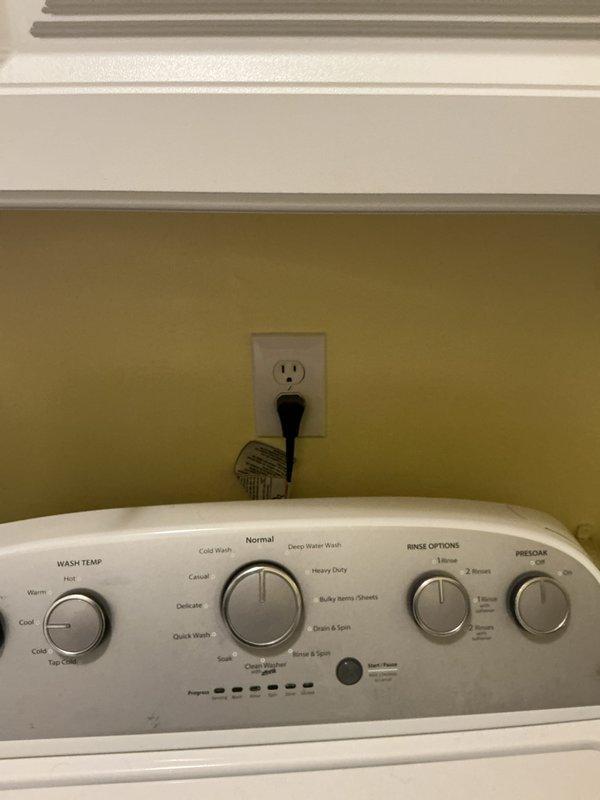 Performed comprehensive electrical inspection of main panel, identifying properly organized but densely arranged wiring with no visible damage. Installed surge protector in electrical panel to provide enhanced protection against power surges. Verified proper electrical connection and outlet functionality for laundry appliances.