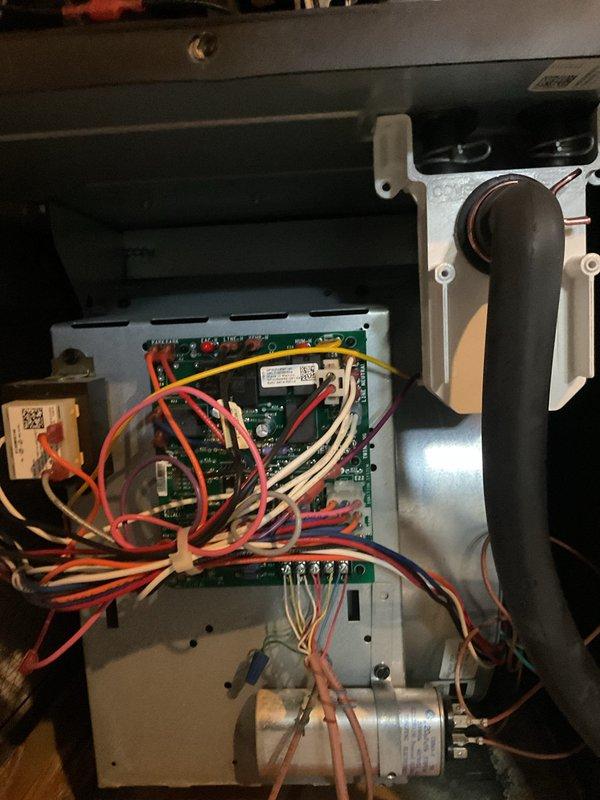Performed routine heating maintenance on residential furnace system. Inspected electrical components including circuit board and wiring connections, verified proper installation of PVC exhaust venting, and examined overall system condition. All components found to be in good working order with no issues identified.