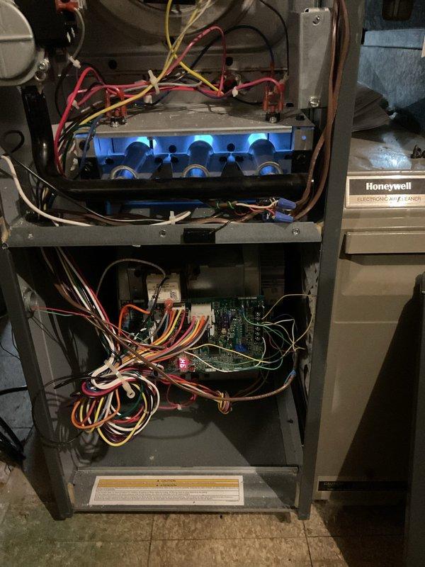 Replaced faulty control board in Honeywell HVAC system as scheduled. Reconnected all wiring harnesses to the new board according to original configuration, ensuring proper color-coding of connections. System tested after installation with successful ignition confirmed and normal operation restored.