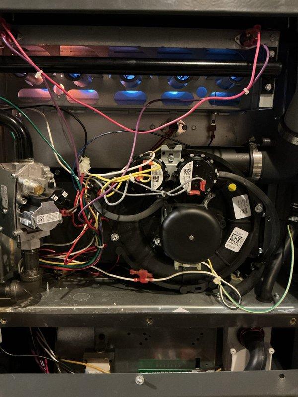 Responded to emergency no-heat service call for gas furnace less than 5 years old that was blowing cold air. Inspection revealed issues with pressure switches and flame sensors requiring adjustment. Performed system diagnostic testing, cleaned components, and restored proper ignition sequence, returning the heating system to normal operation.