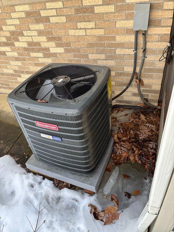 Conducted comprehensive assessment of existing HVAC equipment, including basement furnace unit and primary Comfort Maker system. Evaluated two outdoor condensing units (Goodman model mounted on concrete pad and second unit positioned alongside residence with protective fencing) to prepare replacement options for complete system upgrade.