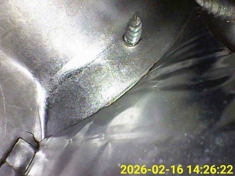 Performed scheduled heating maintenance on furnace system. Inspected internal metal components and removed a bent retention pin/clip. System was fully tested and restored to proper working condition.