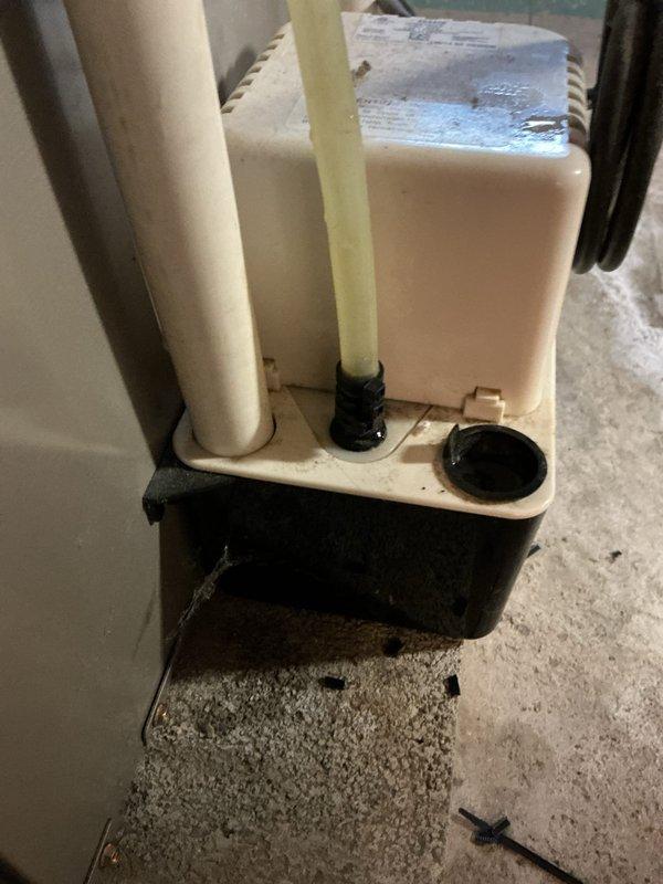 Responded to customer complaint of water pooling around furnace base. Diagnosed issue with condensate pump and inspected surrounding flooring for water damage. Serviced the condensate pump assembly to restore proper drainage function, preventing further water accumulation.