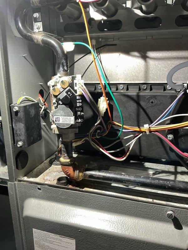 Conducted scheduled heating maintenance on furnace system. Inspected gas valve assembly, control wiring connections, and associated components. Noted oxidation on copper fittings and some corrosion on valve assembly that will require monitoring on future service visits.