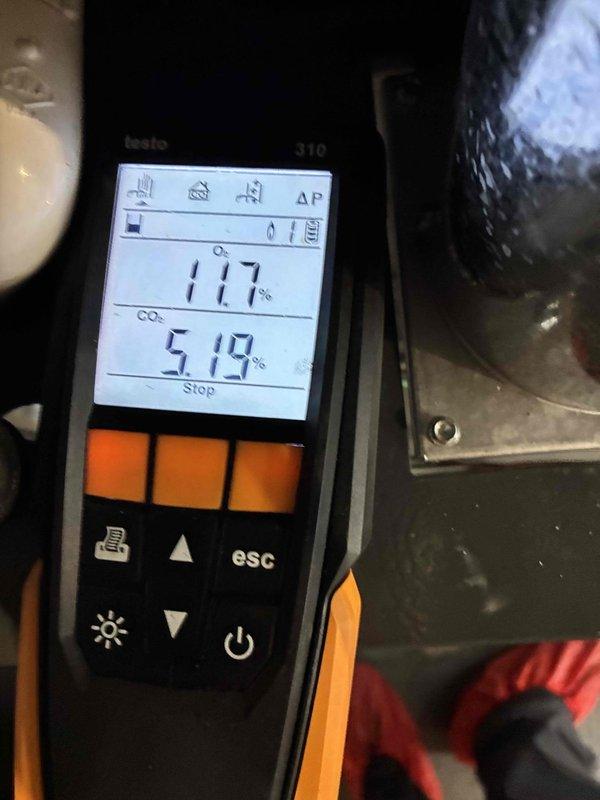 Performed monthly heating maintenance service on unit. Inspected fan motor assembly and electrical connections, ensuring proper wire connections and component integrity. Conducted combustion analysis with Testo 310, measuring oxygen (17.7%) and carbon dioxide (5.19%) levels, confirming system is operating within acceptable parameters.