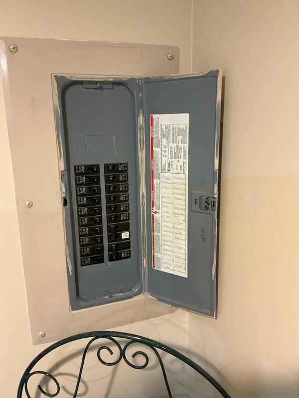 Conducted site evaluation for garage heater installation where no existing heating system was present. Inspected electrical panel to assess available capacity for new unit and documented thermostat/control panel location options. Prepared comprehensive replacement estimate for client consideration.